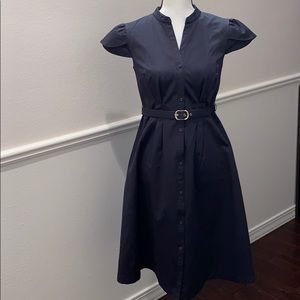 Black capped sleeve belted black dress